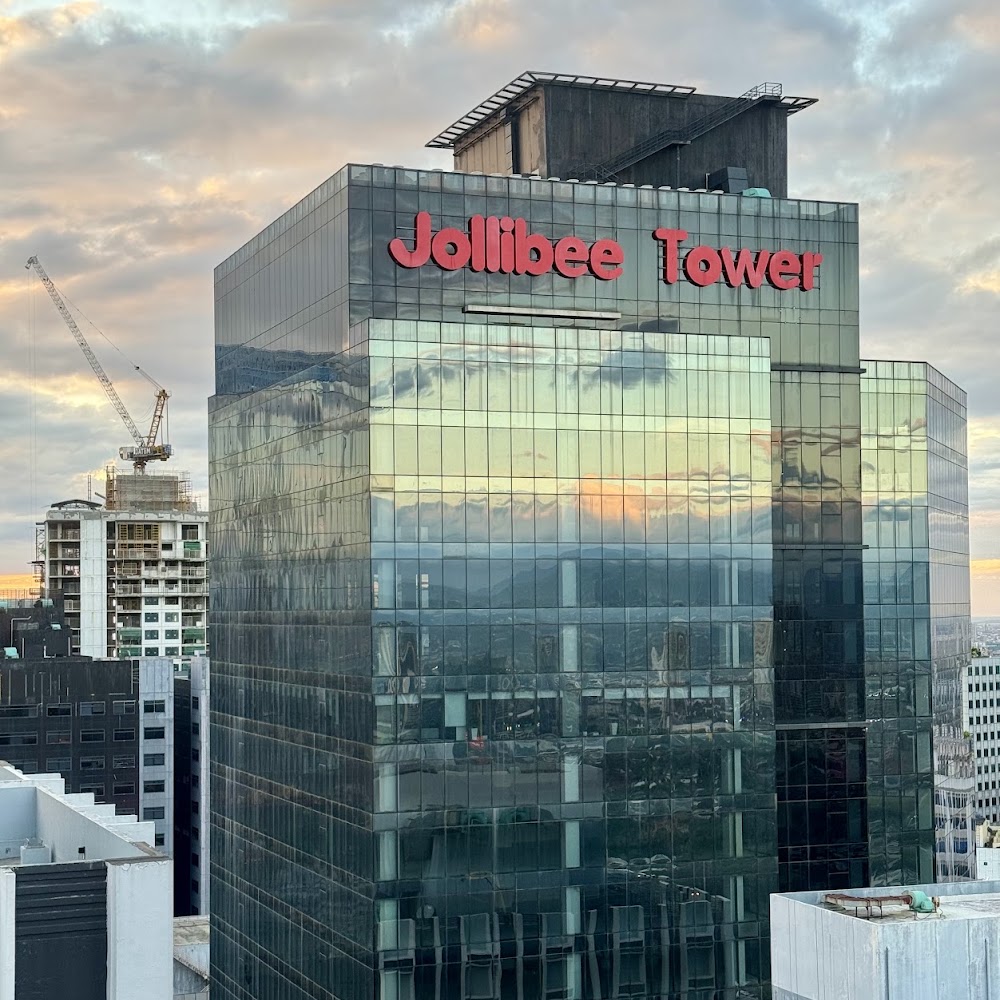 KMC Solutions — Jollibee Tower workspace hero